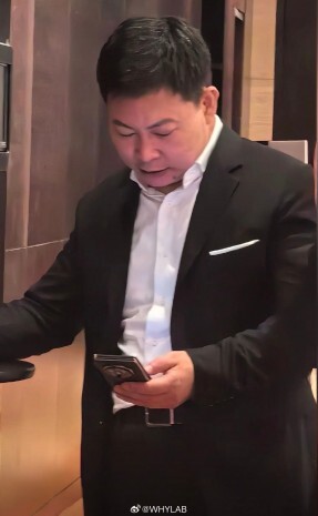 Huawei CEO Richard Yu with a tri-fold smartphone