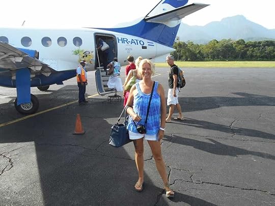 Janice Horton travel by plane Utila Honduras