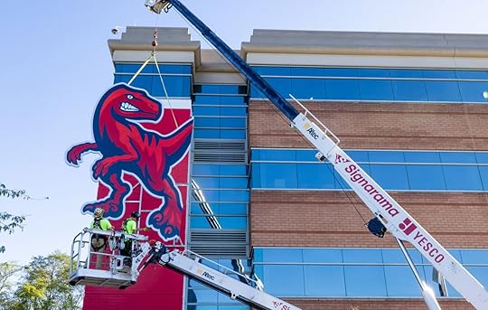 Raptor mascot sign lifted up