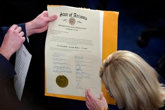 The certification of Electoral College votes for the state of Arizona is unsealed during a joint session of the House and Senate convenes to confirm the electoral votes cast in November's election, at the Capitol.