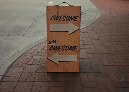 A sign with arrows, one pointing towards “awesome” the other towards “less awesome”. Right and wrong are constructs within that.