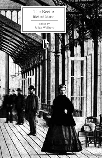 The Broadview Press edition of The Beetle, with a black-and-white cover that includes a vintage photo of a mysterious woman walking away from men who are slightly out of focus. There is an ominous atmosphere in the photo, as if things aren't as they seem.