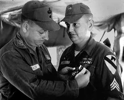 Marvin Wolf receives the Air Medal from Maj. Charles Siler in 1966. Photo courtesy of the author.