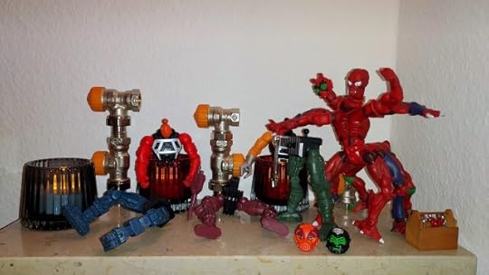 The Masters of the Universe Classics Modulok poses with the dissassembled Multi-Bot