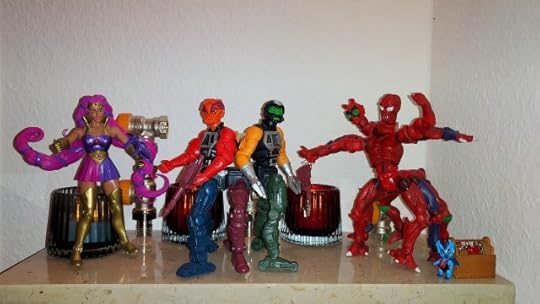 Modulok has fully assembled Multi-Bot, while Entrapta and Imp looks on.