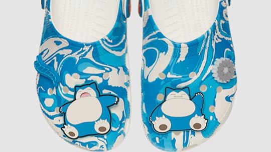 Snorlax Crocs with blue pattern and Snorlax Jibbitz