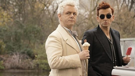 Good Omens shot of Michael Sheen and David Tenant as an angel in white and a demon in black
