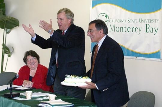 CSUMB Provost Diane Cordero de Noriega, CSUMB President Peter Smith and Leon Panetta revel in the news that CSUMB is finally a accredited institution. The announcement was made in front of faculty and staff and some alumni at the University Center in 2003. Leon Panetta holds a cake as Peter Smith thanks the attended guests (Vern Fisher -- Monterey Herald Archives)