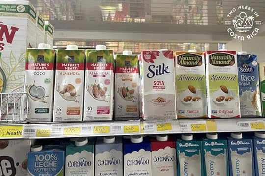 Grocery store shelf in Costa Rica with almond, soy, and rice milk options