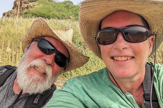 James and Dena climbing a mountain