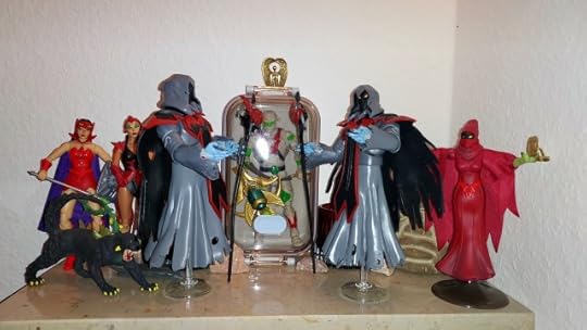 The Horde Wraiths flank the sarcophagus to resurrect the mummy of Sibor, while Shadow Weaver, Catra and Scorpia look on.