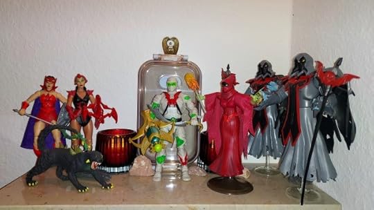 Sibor emerges from his sarcophagus, while Shadow Weaver, Catra, Scorpia and the Horde Wraiths look on.