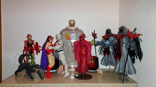 Sibor embraces a horrified Catra, as Scorpia, Shadow Weaver and the Wraiths look on.