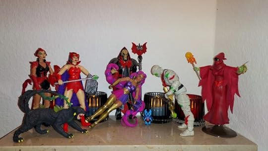 Wrap Trap bows to Hordak, while Shadow Weaver, Scorpia, Entrapta and Catra look on.