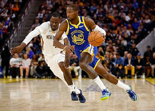 Golden State Warriors’ Jonathan Kuminga (00) dribbles against New Orleans...