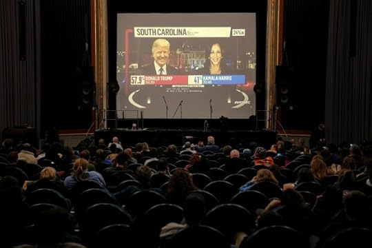 Supporters of U.S. Democratic presidential nominee Vice President Kamala Harris watch as the first results from the state of South Carolina come in during an election night watch party