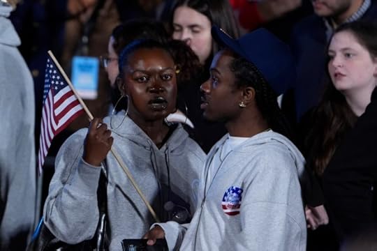 Supporters of Democratic presidential nominee Vice President Kamala Harris leave an election night campaign watch party after it was announced that she would not speak