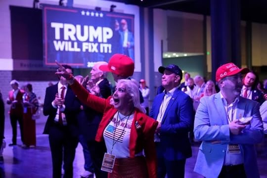 Supporters react as they watch election results at an election night campaign watch party for Republican presidential nominee former President Donald Trump