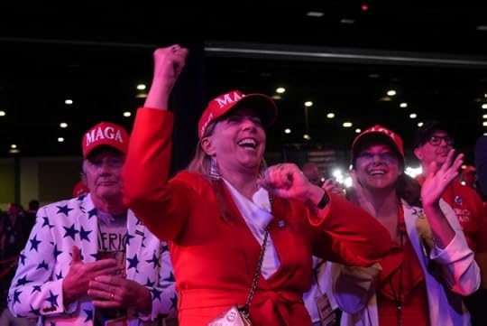 Karen Vaughn reacts with her husband Billy and daughter Anna as they watch election results at an election night campaign watch party for Republican presidential nominee former President Donald Trump