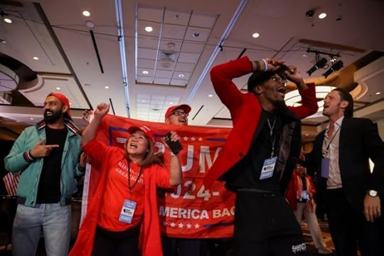 Supporters of Republican presidential nominee former President Donald Trump cheer as Pennsylvania votes are counted