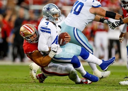 San Francisco 49ers' Nick Bosa (97) sacks Dallas Cowboys starting quarterback Dak Prescott (4) in the second quarter at Levi's Stadium in Santa Clara, Calif., on Sunday, Oct. 27, 2024. (Nhat V. Meyer/Bay Area News Group)