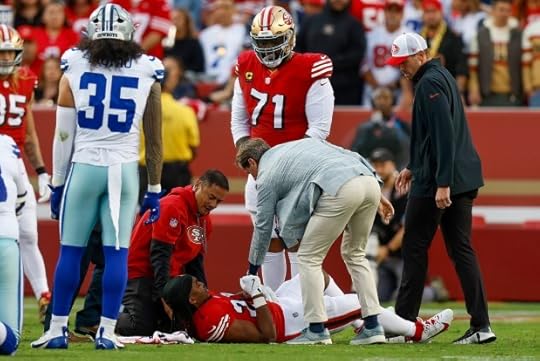 San Francisco 49ers' Jordan Mason (24) lies on the field after being injured against the Dallas Cowboys in the first quarter at Levi's Stadium in Santa Clara, Calif., on Sunday, Oct. 27, 2024. (Nhat V. Meyer/Bay Area News Group)