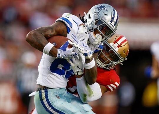 San Francisco 49ers' Ji'Ayir Brown (27) tackles Dallas Cowboys' CeeDee Lamb (88) after a catch in the second quarter at Levi's Stadium in Santa Clara, Calif., on Sunday, Oct. 27, 2024. (Nhat V. Meyer/Bay Area News Group)
