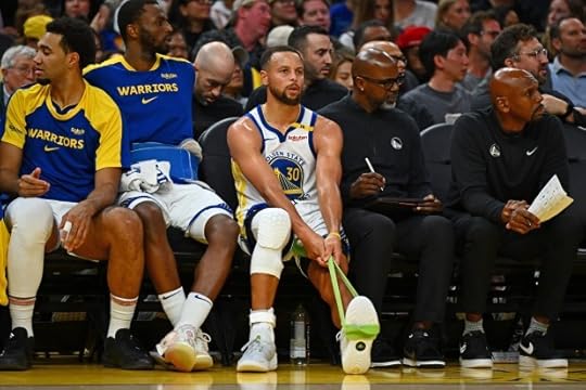Golden State Warriors' Stephen Curry (30) stretches his left ankle after sustaining an injury in the third quarter of their NBA game at Chase Center in San Francisco, Calif., on Sunday, Oct. 27, 2024. Curry would remain in the game but would re-injury his ankle and leave the game in the fourth quarter. (Jose Carlos Fajardo/Bay Area News Group)
