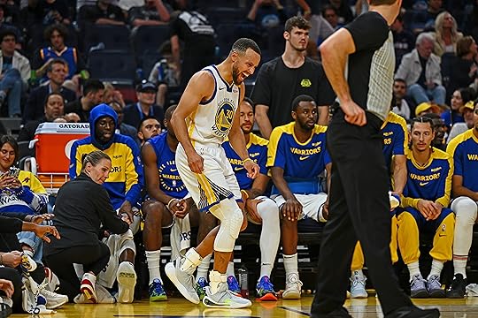 Golden State Warriors’ Stephen Curry (30) yells after sustaining an...