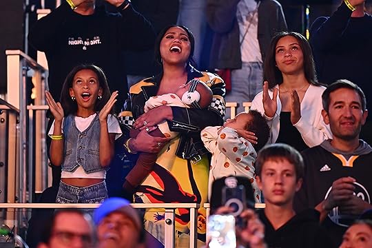The family of Golden State Warriors’ Stephen Curry (30) cheer...