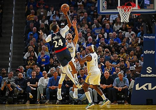 Los Angeles Clippers’ Norman Powell (24) shoots past Golden State...