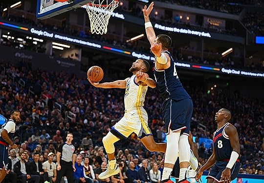 Golden State Warriors’ Stephen Curry (30) attempts to shoot under...