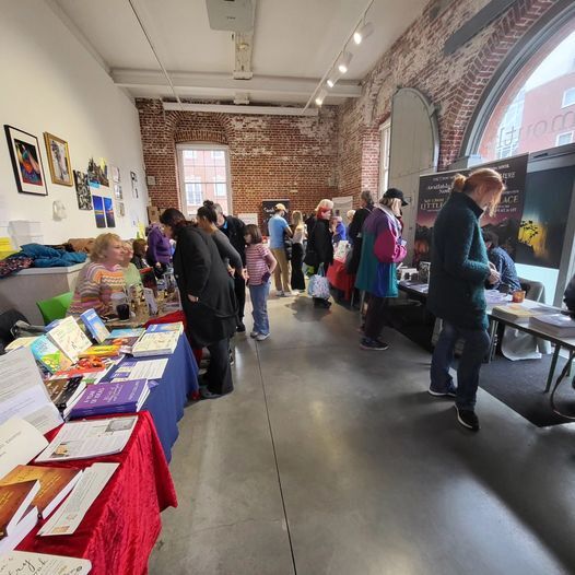 May be an image of 11 people, crowd and text