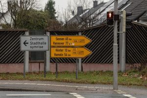 first street sign pointing to Hanover