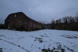ruins of a large building on the shores of the Weser