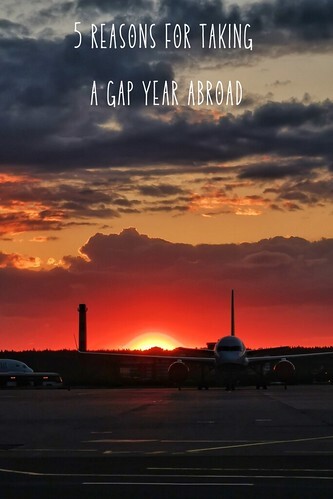 Airplane on the tarmac, dark skies behind. From 5 Reasons for Taking a Gap Year Abroad