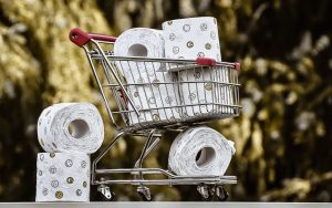 shopping cart full of toilet paper