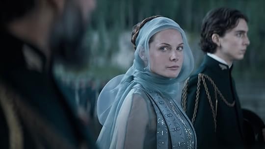 Lady Jessica, with Paul to her right, looks at Duke Leto in Dune