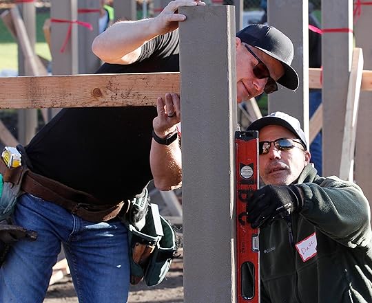 Volunteers help construct Tatum’s Treehouse, an accessible playground in Carmel...