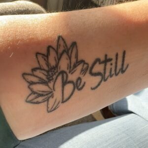 Tattoo that says Be Still.