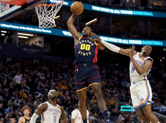 Golden State Warriors' Jonathan Kuminga #00 dunks past Oklahoma City Thunder's Jalen Williams #8 in the second quarter of their NBA game at the Chase Center in San Francisco, Calif., on Wednesday, Nov. 27, 2024. (Jane Tyska/Bay Area News Group)