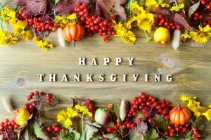 Happy Thanksgiving message with fruit and vegetables.