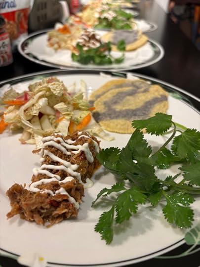 A closeup on the shredded duck that looks a lot like pork carnitas. 