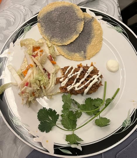 Overhead view of the plate with colorful tortillas and mexican food. 