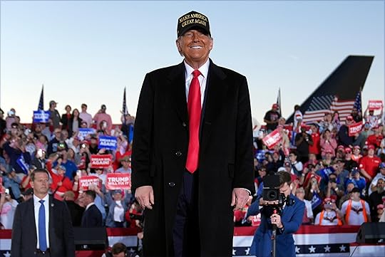Republican presidential nominee former President Donald Trump smiles at a campaign rally