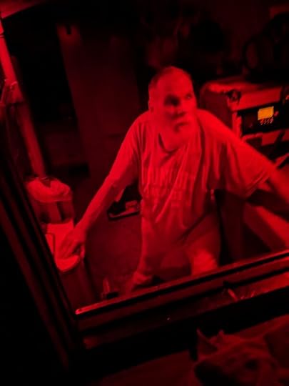 James getting ready for his watch in the night-vision-safe red lights