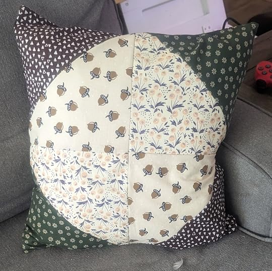 Acorn and triangle square quilted pillows