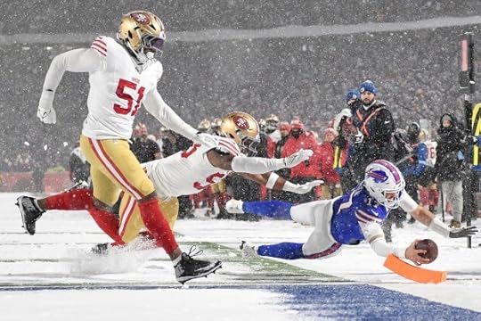 Buffalo Bills quarterback Josh Allen, bottom right, dives toward the end zone to score past San Francisco 49ers defensive end Robert Beal Jr. (51) and linebacker Dee Winters during the second half of an NFL football game in Orchard Park, N.Y., Sunday, Dec. 1, 2024. (AP Photo/Adrian Kraus)