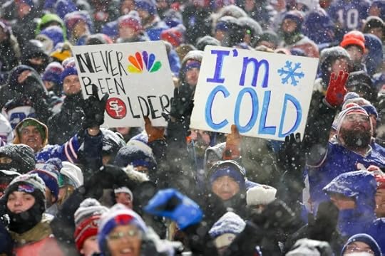 Football fans cheer during the third quarter of a game between the San Francisco 49ers and the Buffalo Bills at Highmark Stadium on Dec. 01, 2024 in Orchard Park, New York. (Photo by Timothy T Ludwig/Getty Images)