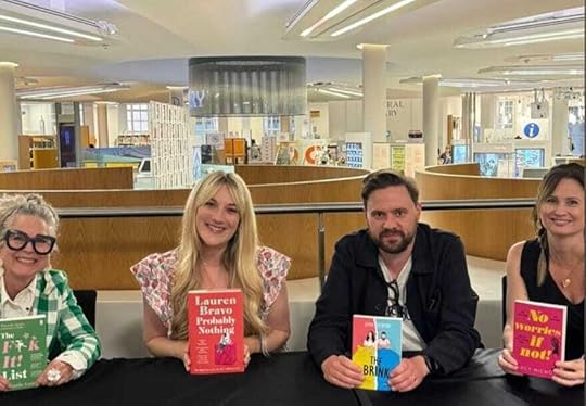 Four authors holding their books from left to right, Melanie Cantor and The F**K It List, Lauren Bravo holding Probably Nothing, Jamie Fewery holding The Brink and me, Lucy Nichol, holding No Worries if Not!